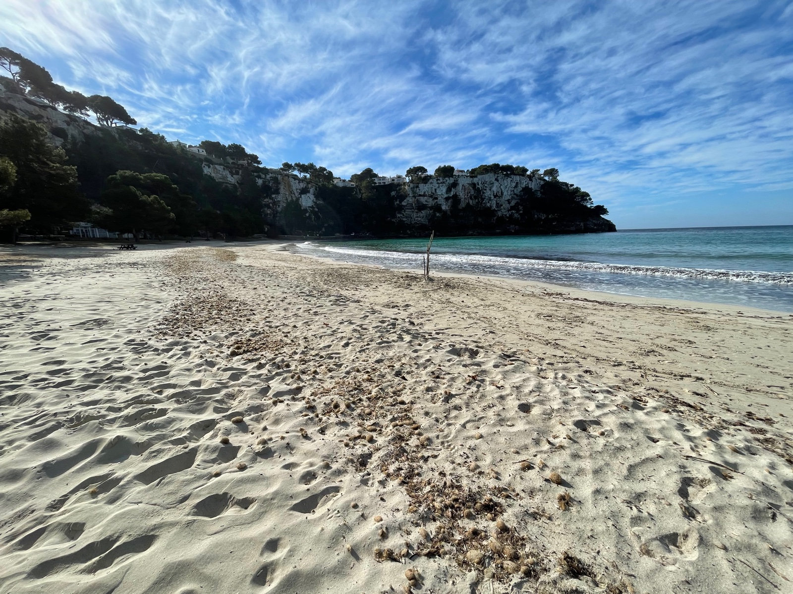Empty white sand beach at Cala Galdana on a clear winter morning